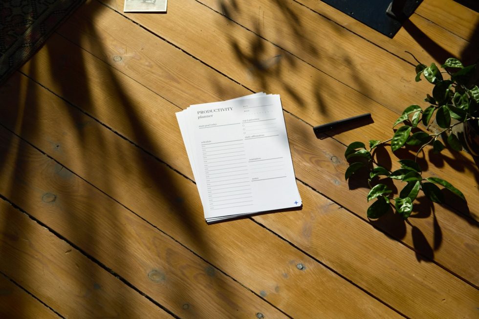 a piece of paper sitting on top of a wooden table